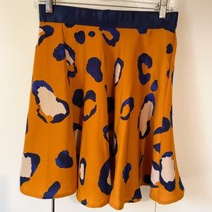 Bold burnt orange skirt